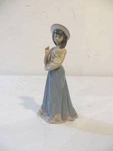 lot 32 image: Lladro Girl with Dog (Elizabeth) Figurine