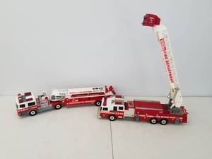 Two Toy Fire Trucks