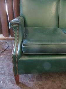 lot 16 image: Studded Green Loveseat