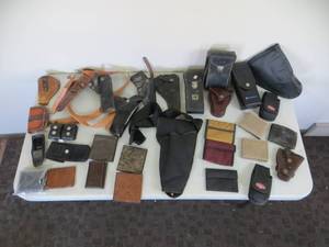 lot 71 image: Gun Holsters, Wallets, and More