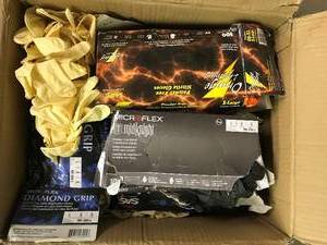 lot 16 image: Box full of Rubber Gloves