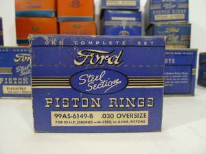 lot 171 image: Large Lot of NOS Vintage FORD Auto Parts Piston Rings