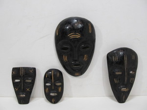 lot 42 image: Graduating Size Vintage Hand Carved Wood Tribal Masks