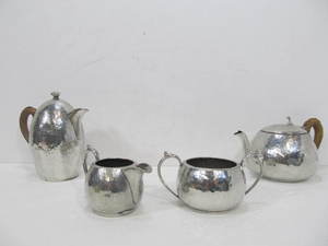 lot 74 image: Antique Arts & Crafts Period English Hand Hammered Pewter Tea Serving Set
