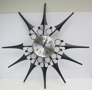 lot 138 image: Mid Century Metal UNITED Starburst Wall Clock (As Is)