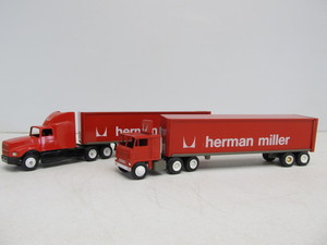 lot 209 image: Pair of Winross HERMAN MILLER Diecast Metal Promo Semi Trucks