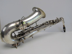 lot 51 image: Excellent Early 1920s Vintage BUESCHER Silver Wash True-Tone Low Pitch Saxophone