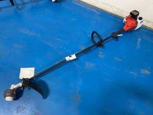 lot 61 image: HOMELITE 2-Cycle 26 CC Curved Shaft Gas Trimmer