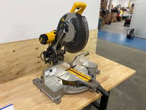 lot 65 image: DEWALT DW716 12 Miter Saw with Blade