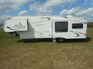 lot 1 image: 2009 Keystone Cougar Travel Trailer
