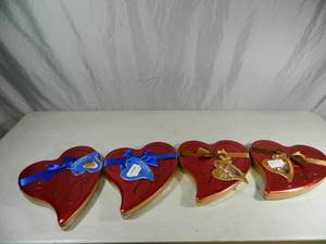 lot 37 image: 4 New Tins of Dove Chocolates