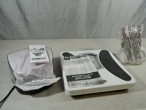 lot 75 image: New Conair Facial Cleansing Brush, Scale, and Curler Set