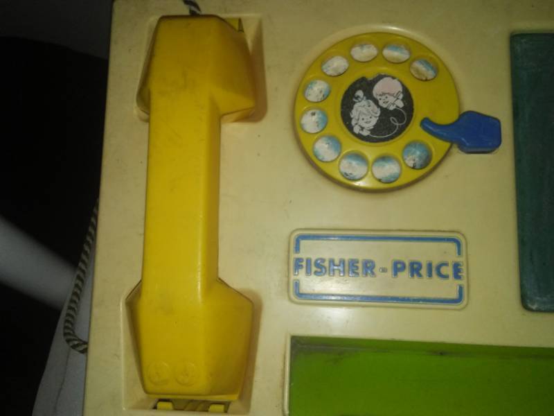 lot 286 image: Vintage Fisher Price Phone & Tupperware Truck