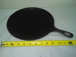 lot 219 image: 10.5  Lodge Cast griddle.