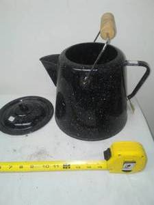 lot 309 image: I gallon enamel ware coffee pot lid.