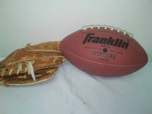 lot 313 image: Kids glove & Junior football.