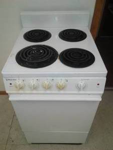 lot 348 image: Apartment size electric Stove. Everything works great.