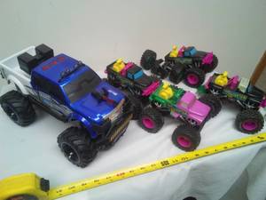 lot 362 image: 4 monster truck toys & parts truck.