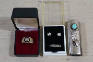 lot 5 image: Ring, Earrings, Lighter Sleeve