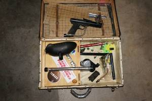 lot 77 image: Vintage Tippmann Paintball Gun with Accessories