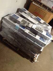 lot 9 image: Pallet of Assorted Glacier Bay faucets ,hand-shower holders, shower heads Costumer returns various conditions