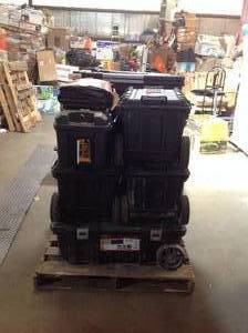 lot 12 image: Pallet of assorted garage items,  storage bins, covers various conditions and models customer returns