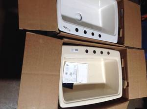 lot 24 image: Pallet of  KOHLER Cape Dory Drop-in Cast Iron 33 in. 4-Hole Single Bowl Kitchen Sink in White and sail ( in good condition )