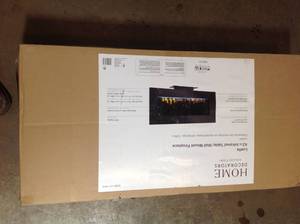lot 35 image: Home Decorators Collection 42 in. Infrared Wall Mount Electric Fireplace in Black Close in good condition