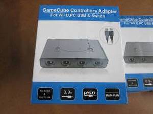 lot 49 image: 8 Game Cube Controllers Adapters Z3...