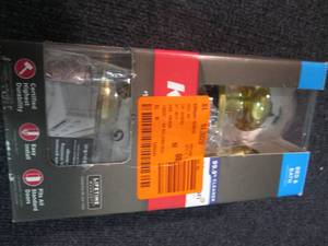lot 179 image: Kwikset Juno Polished Brass Privacy...