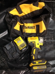 lot 62 image: Dewalt 20-Volt MAX Lithium-Ion Cordless 14 in. Impact Driver , bag, 1 battery and charger used in very good condition