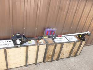 lot 5 image: Craftsman 2 cycle Weed Trimmer. Lightly used. Tested & works. As shown.