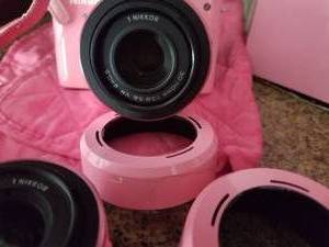 lot 76 image: Nikon Pink N1 Camera Package with Polariod 300