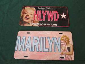 lot 122 image: (2) Marilyn Monroe Metal License Pl...