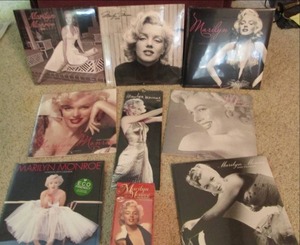 lot 75 image: Marilyn Monroe VHS & Calendar...