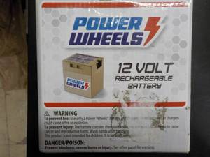 lot 26 image: Power Wheels 12 Volt Rechargeable B...