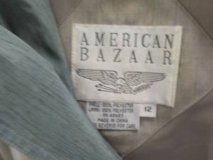 lot 61 image: American Bazaar size 1214 Rain Coa...