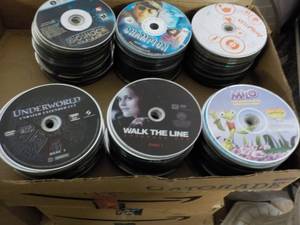 lot 76 image: 300 or so DVDs, CDs, Audio Books a...