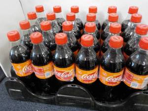 lot 112 image: Case of 24 - 16 oz Bottles Coca Col...