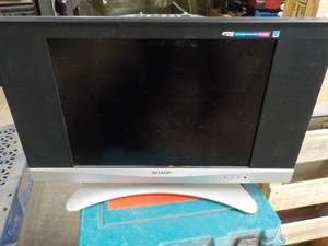 lot 139 image: 19 Sharp TV Powers On...
