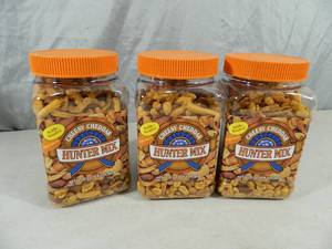 lot 83 image: 3 New Canisters of Cheesy Cheddar Hunters Mix