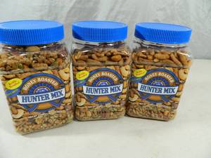 lot 114 image: 3 New Canisters of Honey Roasted Hunters Mix