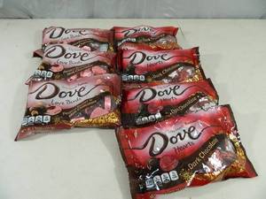 lot 142 image: 7 New Bags of Dove Chocolates