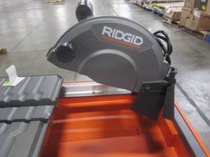 lot 310 image: Ridgid 9 Amp Corded 7 in. Wet Tile Saw with Stand R4031S