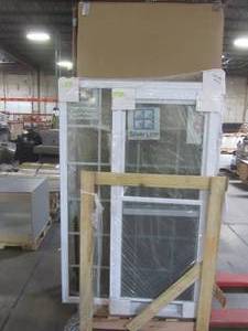lot 209 image: WHOLESALE MIXED PALLET OF SLABS, STORM DOORS AND WINDOWS