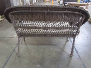 lot 214 image: Hampton Bay Mix and Match Brown Wicker Outdoor Stack Loveseat with Beige Cushion 65-51686B-3A