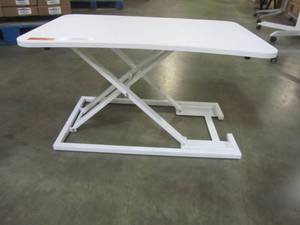 lot 54 image: Woodmaya Height Adjustable Standing Desk with Premium Air Pump Lift - Desk Stand Raiser in White WMDKR-0005WHT - LOW RESERVE