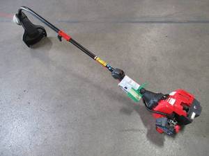 lot 40 image: Troy-Bilt 25 cc Gas 2-Cycle Curved Shaft Attachment Capable String Trimmer with JumpStart Capabilities, TB25C EC - Runs Rough, Missing Grip
