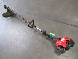 lot 41 image: CRAFTSMAN 25-cc 2-cycle 17-in Straight Shaft Gas String Trimmer with Attachment and Edger Capability CMXGTAMD25SC - USED Runs Rough.