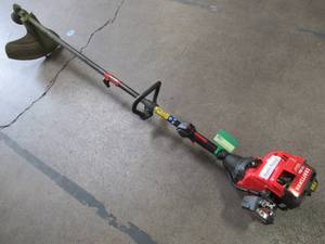 lot 43 image: CRAFTSMAN 25-cc 2-cycle 17-in Straight Shaft Gas String Trimmer with Attachment and Edger Capability CMXGTAMD25SC - USED Runs Rough